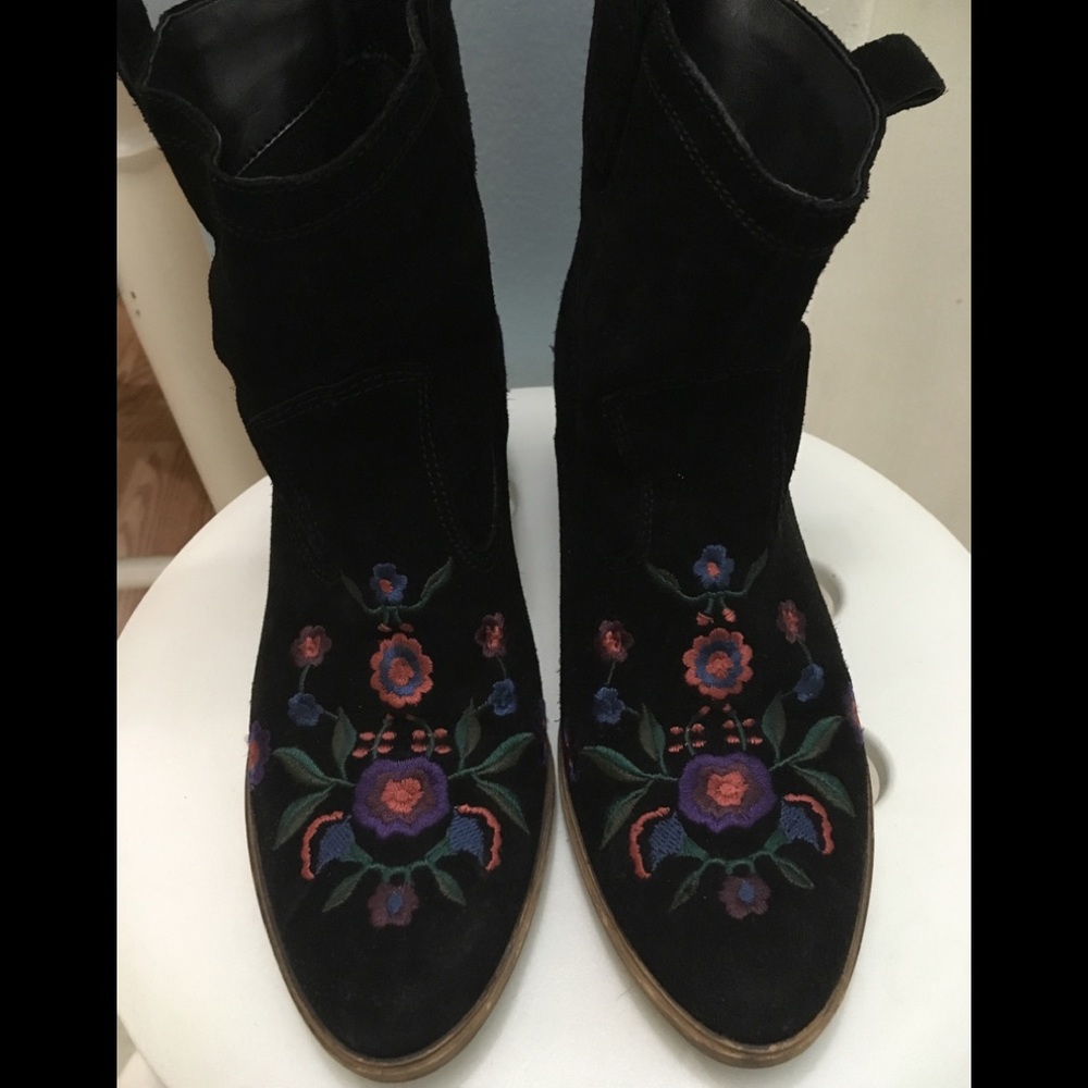 Black Aldo boots, or booties.